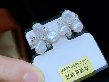 Aurora Luster Petal Stud Earrings | Nucleus-Free Freshwater Pearls · Matte Silver Finish · Universally Flattering