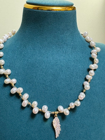 Freshwater Pearl Wing Pendant Necklace | 7–8mm Oval Pearls · 10mm Accent Pearl · Stacked Flat Baroque Pearls · Zircon Wing Pendant · Adjustable Length