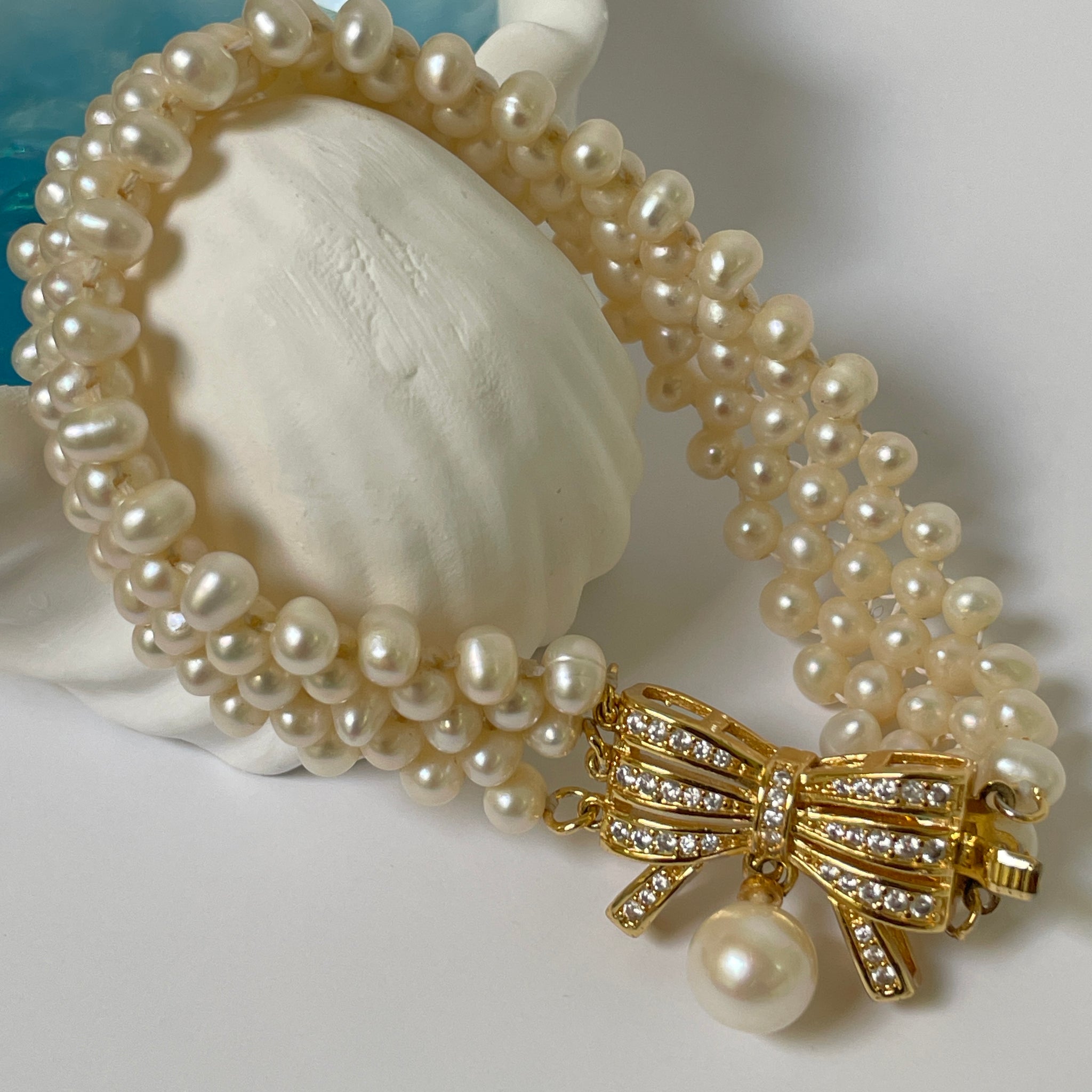 Layered Freshwater Pearl Bracelet with Bow Clasp | 3–4mm & 7–8mm Pearls · Handmade Elegance