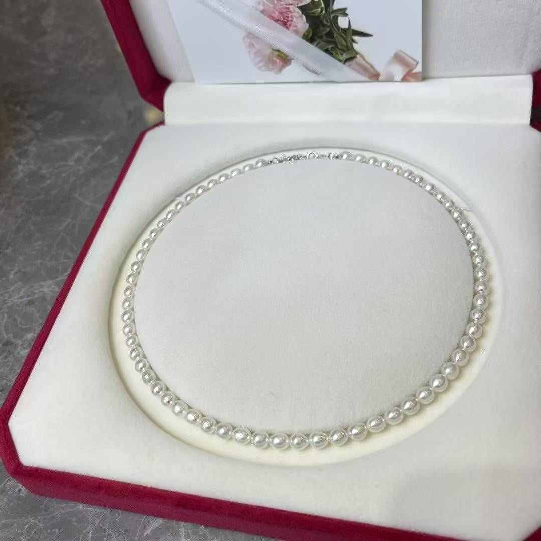 Delicate Freshwater Rice Pearl Necklace | 5–6mm Near-Flawless · Sterling Silver Adjustable Chain