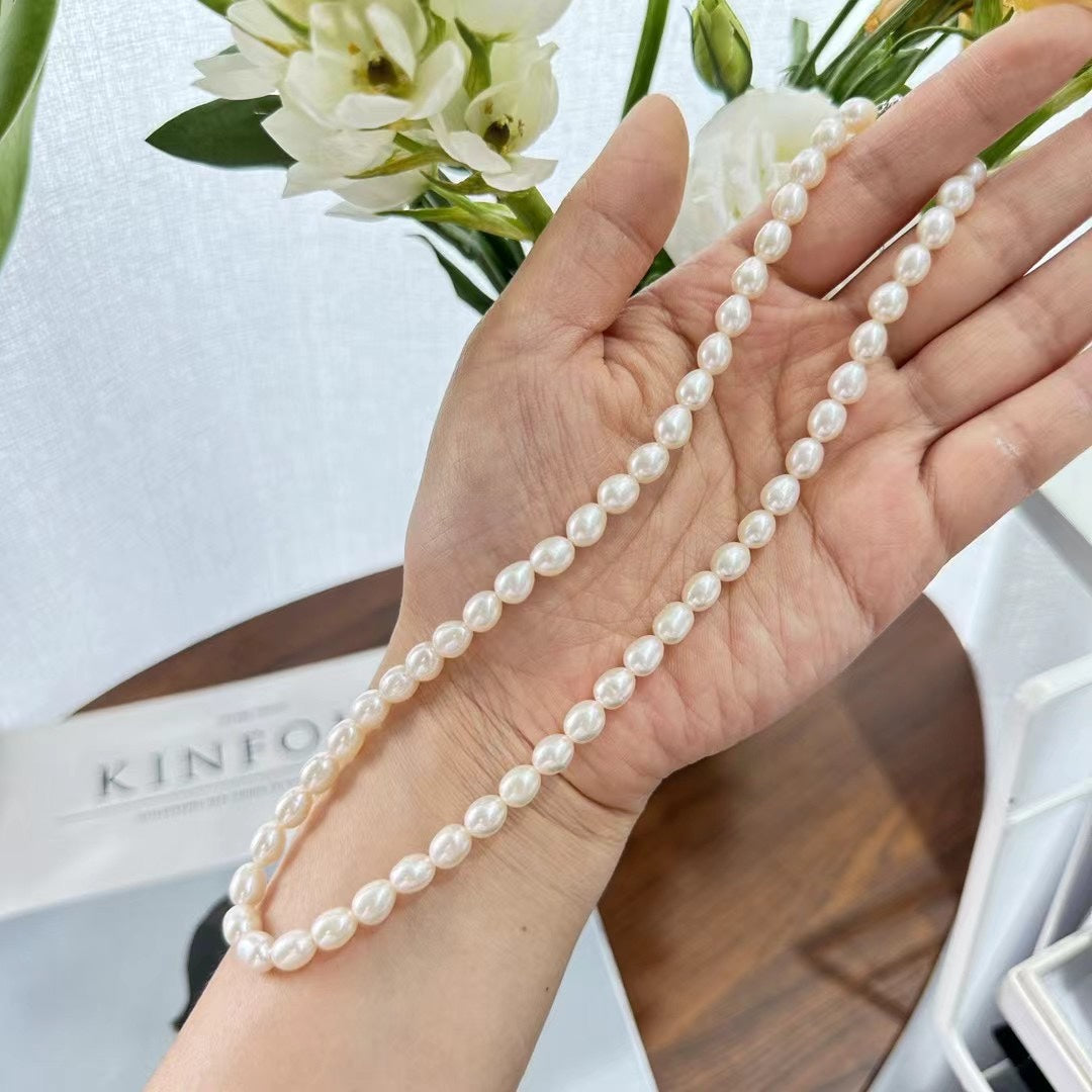 High-Luster Rice Pearl Necklace | 5–6mm Nucleation-Free Freshwater Pearls · Sterling Silver Extension Chain